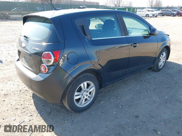 2014 Chevrolet Sonic LT with VIN 1G1JC6SGXE4132765, listed as a IAAI auction lot 41747782 with 144,485 mi miles. Bid and sale history available at carsss.com. Image 4.