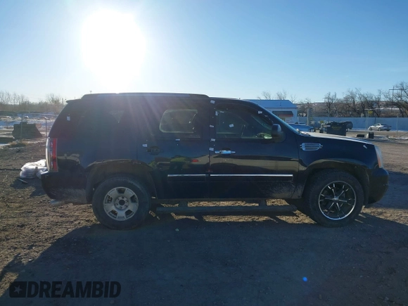 2013 GMC Yukon Denali with VIN 1GKS2EEF7DR310276, listed as a IAAI auction lot 41432983 with 243,119 mi miles. Bid and sale history available at carsss.com. Image 13.