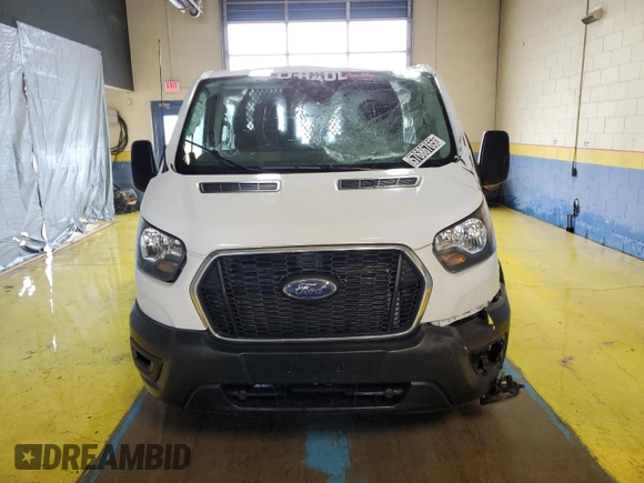 2023 Ford Transit Cargo z VIN 1FTBR1Y83PKB06391, wystawiony jako Copart lot #57686765 z przebiegiem Nie podano mil oraz Czysty tytuł • Clean title. Historia ofert i sprzedaży dostępna na DreamBid. Obrazek 5.