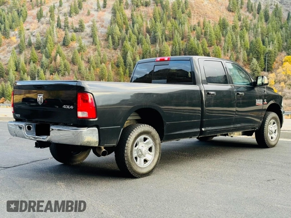 2015 Ram 3500 Big Horn with VIN 3C63R3HL4FG625161, listed as a Copart auction lot 80120264 with 111,896 mi miles and Salvage Title. Bid and sale history available at carsss.com. Image 4.