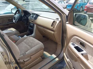 2004 Honda Pilot EX with VIN 2HKYF18434H575250, listed as a IAAI auction lot 42219882 with 196,515 mi miles and . Bid and sale history available at carsss.com. Image 5.