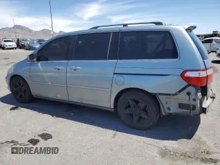 2005 Honda Odyssey Touring z VIN 5FNRL38805B131416, wystawiony jako Copart lot #59157395 z przebiegiem 263 087 mil mil oraz Szkoda całkowita • Salvage title. Historia ofert i sprzedaży dostępna na DreamBid. Obrazek 2.