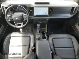 2022 Ford Bronco with VIN 1FMEE5DH7NLB89588, listed as a Copart auction lot 59777455 with 25,323 mi miles and Salvage title. Bid and sale history available at DreamBid. Image 8.