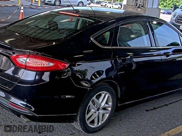 2016 Ford Fusion SE with VIN 3FA6P0H75GR318851, listed as a IAAI auction lot 42853126 with 59,063 mi miles and . Bid and sale history available at DreamBid. Image 16.