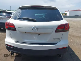 2014 Mazda CX-9 Touring z VIN JM3TB3CV7E0426900, wystawiony jako IAAI lot #42796725 z przebiegiem Nie podano mil oraz . Historia ofert i sprzedaży dostępna na DreamBid. Obrazek 16.