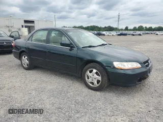 2000 Honda Accord EX z VIN 1HGCG6674YA001515, wystawiony jako Copart lot #56257935 z przebiegiem 215 030 mil mil oraz Czysty tytuł • Clean title. Historia ofert i sprzedaży dostępna na DreamBid. Obrazek 4.