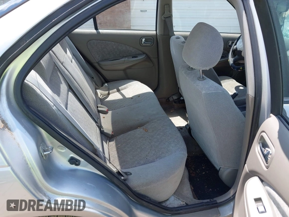 2003 Nissan Sentra XE z VIN 3N1CB51D43L714603, wystawiony jako IAAI lot #42392644 z przebiegiem 201 656 mil mil oraz . Historia ofert i sprzedaży dostępna na DreamBid. Obrazek 8.