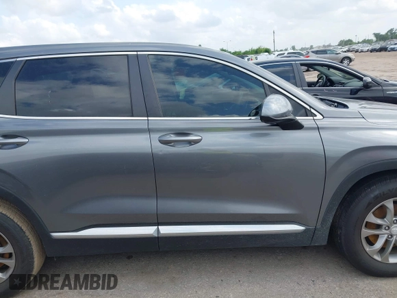 2020 Hyundai Santa Fe SE z VIN 5NMS23AD3LH155930, wystawiony jako IAAI lot #42155889 z przebiegiem 64 441 mil mil oraz . Historia ofert i sprzedaży dostępna na DreamBid. Obrazek 14.