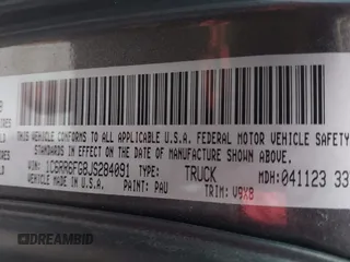 2018 Ram 1500 Tradesman z VIN 1C6RR6FG8JS284091, wystawiony jako IAAI lot #41439973 z przebiegiem 62 429 mil mil oraz . Historia ofert i sprzedaży dostępna na DreamBid. Obrazek 9.
