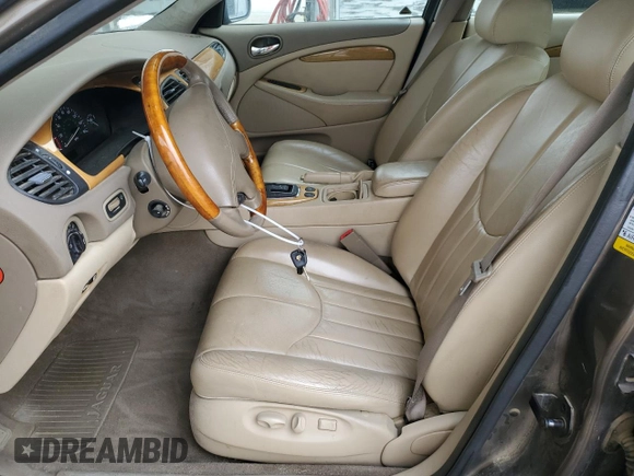 2001 Jaguar S-Type with VIN SAJDA01P21GM04051, listed as a Copart auction lot 46668745 with 81,765 mi miles and Salvage Title. Bid and sale history available at DreamBid. Image 7.