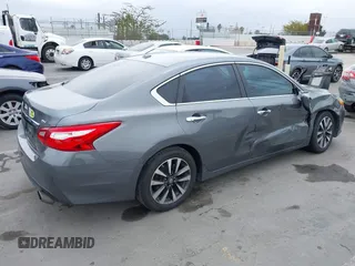 2016 Nissan Altima S z VIN 1N4AL3AP5GC131352, wystawiony jako IAAI lot #42418679 z przebiegiem 106 576 mil mil oraz . Historia ofert i sprzedaży dostępna na DreamBid. Obrazek 4.