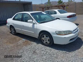 1999 Honda Accord EX z VIN 1HGCG1655XA038752, wystawiony jako IAAI lot #42429495 z przebiegiem 246 537 mil mil oraz . Historia ofert i sprzedaży dostępna na DreamBid. Obrazek 1.