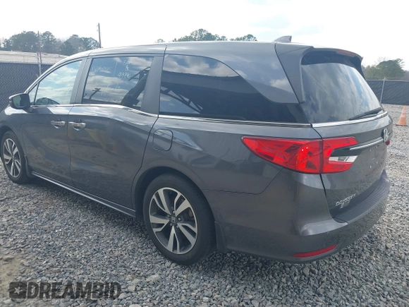 2023 Honda Odyssey Touring with VIN 5FNRL6H86PB065670, listed as a IAAI auction lot 41691093 with 22,518 mi miles and . Bid and sale history available at DreamBid. Image 3.
