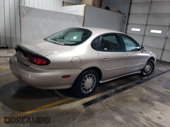 1999 Ford Taurus SE with VIN 1FAFP53S6XA242981, listed as a Copart auction lot 43211425 with 111,966 mi miles and Salvage title. Bid and sale history available at DreamBid. Image 3.