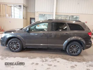 2018 Dodge Journey SE with VIN 3C4PDCAB9JT428917, listed as a IAAI auction lot 41578750 with 136,886 mi miles and . Bid and sale history available at DreamBid. Image 14.