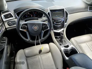 2015 Cadillac SRX Luxury Collection z VIN 3GYFNBE3XFS599303, wystawiony jako Copart lot #55432285 z przebiegiem 201 432 mil mil oraz Czysty tytuł • Clean title. Historia ofert i sprzedaży dostępna na DreamBid. Obrazek 8.