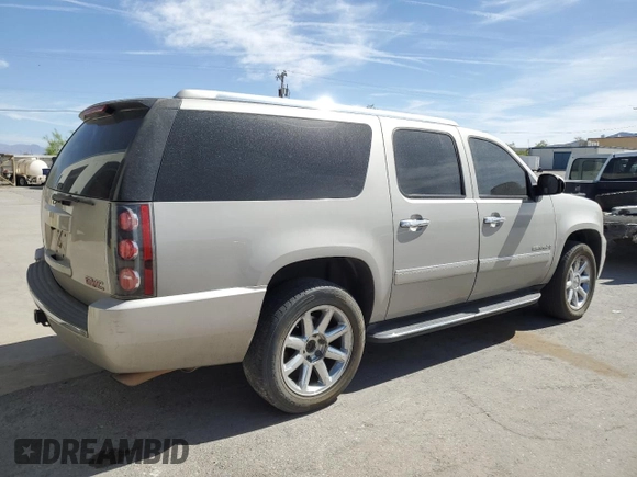 2009 GMC Yukon XL z VIN 1GKFC06269J102165, wystawiony jako Copart lot #54874955 z przebiegiem 248 831 mil mil oraz Szkoda całkowita • Salvage title. Historia ofert i sprzedaży dostępna na DreamBid. Obrazek 3.