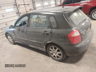 2005 Kia Spectra with VIN KNAFE161255083357, listed as a IAAI auction lot 41445285 with 90,349 mi miles. Bid and sale history available at carsss.com. Image 3.