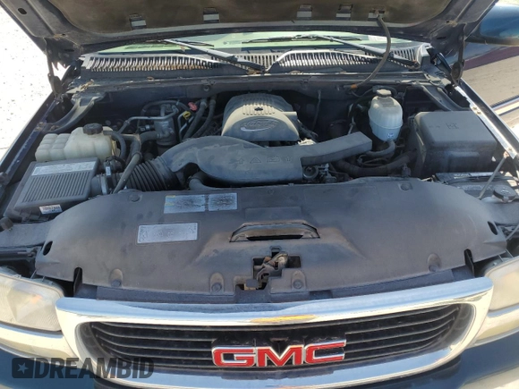 2005 GMC Yukon SLT with VIN 1GKEK13T15J239462, listed as a Copart auction lot 52131435 with 164,696 mi miles and Salvage Title. Bid and sale history available at carsss.com. Image 12.