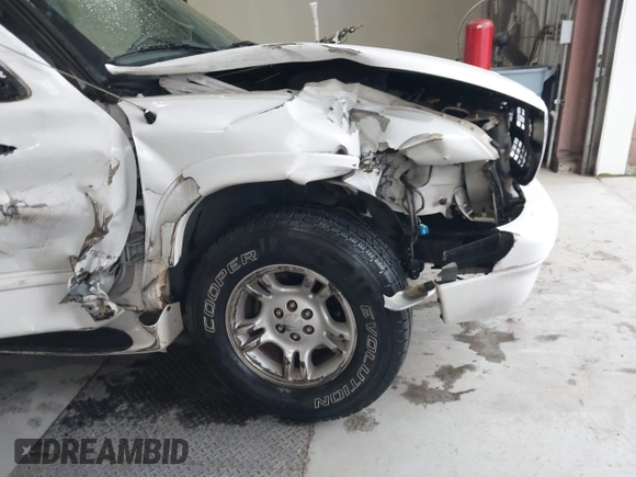 2002 Dodge Durango z VIN 1B4HR48N72F144237, wystawiony jako IAAI lot #42242043 z przebiegiem 72 065 mil mil oraz . Historia ofert i sprzedaży dostępna na DreamBid. Obrazek 6.