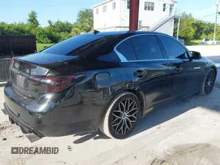 2014 Infiniti Q50 Premium with VIN JN1BV7AP0EM689359, listed as a IAAI auction lot 42671613 with 152,334 mi miles and . Bid and sale history available at DreamBid. Image 4.