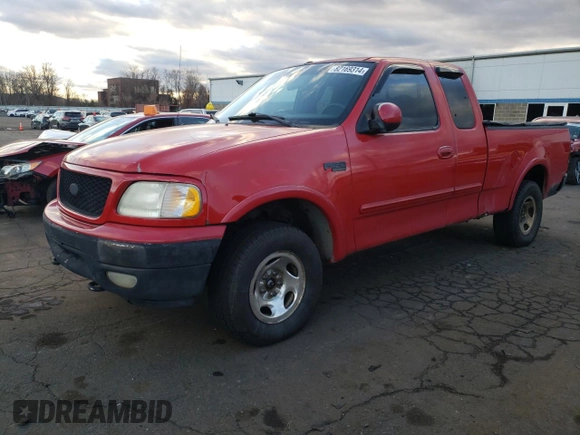 2000 Ford F-150 XL with VIN 1FTRX18W6YNC32005, listed as a Copart auction lot 82169314 with 289,320 mi miles and Salvage Title. Bid and sale history available at carsss.com. Image 1.
