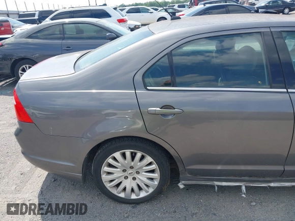 2010 Ford Fusion Hybrid with VIN 3FADP0L37AR270739, listed as a IAAI auction lot 42143035 with 238,111 mi miles. Bid and sale history available at carsss.com. Image 15.
