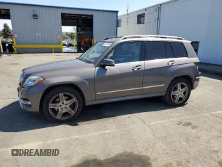 2014 Mercedes-Benz GLK 250 with VIN WDCGG0EB1EG256354, listed as a Copart auction lot 52910805 with 135,038 mi miles and Salvage Title. Bid and sale history available at DreamBid. Image 1.