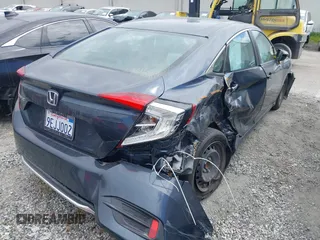 2020 Honda Civic LX z VIN 19XFC2F69LE203697, wystawiony jako IAAI lot #41608520 z przebiegiem 46 735 mil mil oraz . Historia ofert i sprzedaży dostępna na DreamBid. Obrazek 4.