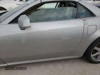 2004 Cadillac XLR z VIN 1G6YV34A045603308, wystawiony jako Copart lot #75459524 z przebiegiem Nie podano mil oraz Szkody całkowita. Historia ofert i sprzedaży dostępna na DreamBid. Obrazek 7.