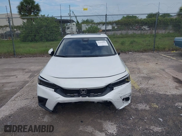 2023 Honda Civic EX-L with VIN 19XFL1H70PE014510, listed as a IAAI auction lot 42395890 with 14,163 mi miles and . Bid and sale history available at DreamBid. Image 6.