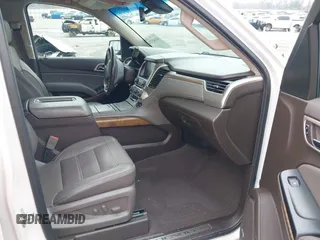 2019 GMC Yukon Denali with VIN 1GKS1CKJ7KR364240, listed as a IAAI auction lot 41645374 with 104,956 mi miles. Bid and sale history available at carsss.com. Image 5.