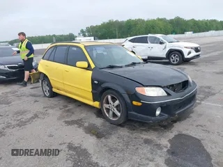 2003 Mazda Protege z VIN JM1BJ245631111660, wystawiony jako IAAI lot #42155636 z przebiegiem 243 453 mil mil oraz . Historia ofert i sprzedaży dostępna na DreamBid. Obrazek 1.