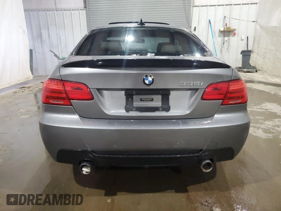 2012 BMW 3 Series 335i with VIN WBAKG7C52CE802607, listed as a Copart auction lot 82833794 with 0 mi miles and Salvage Title. Bid and sale history available at carsss.com. Image 6.