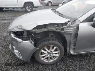 2016 Mazda Mazda3 i Sport with VIN 3MZBM1U76GM306988, listed as a IAAI auction lot 41286055 with 116,175 mi miles. Bid and sale history available at carsss.com. Image 6.