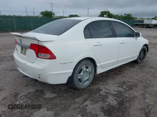 2011 Honda Civic LX with VIN 2HGFA1F56BH527671, listed as a IAAI auction lot 42166647 with 162,969 mi miles and . Bid and sale history available at DreamBid. Image 4.