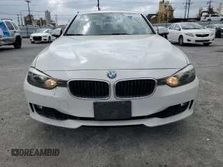 2015 BMW 3 Series 328i with VIN WBA3C1C55FK120405, listed as a Copart auction lot 54374035 with 121,411 mi miles and Salvage title. Bid and sale history available at DreamBid. Image 5.