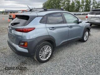 2021 Hyundai Kona SEL z VIN KM8K2CAA9MU605155, wystawiony jako Copart lot #56646585 z przebiegiem 22 538 mil mil oraz Szkoda całkowita • Salvage title. Historia ofert i sprzedaży dostępna na DreamBid. Obrazek 3.