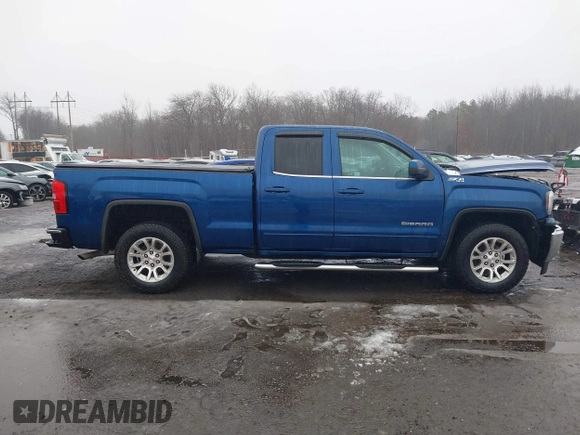 2017 GMC Sierra 1500 SLE z VIN 1GTV2MEC4HZ214619, wystawiony jako IAAI lot #41522006 z przebiegiem 184 513 mil mil oraz . Historia ofert i sprzedaży dostępna na DreamBid. Obrazek 13.