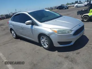2015 Ford Focus SE z VIN 1FADP3F28FL276155, wystawiony jako IAAI lot #42675931 z przebiegiem 129 641 mil mil oraz . Historia ofert i sprzedaży dostępna na DreamBid. Obrazek 1.