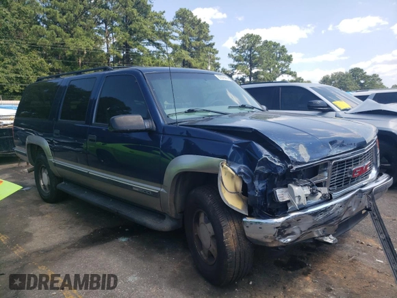 1999 GMC Suburban z VIN 3GKFK16R2XG544767, wystawiony jako Copart lot #67078414 z przebiegiem 154 145 mil mil oraz Szkoda całkowita • Salvage title. Historia ofert i sprzedaży dostępna na DreamBid. Obrazek 4.