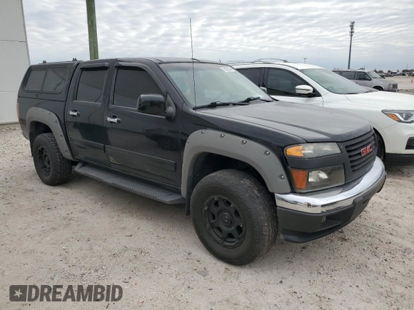2010 GMC Canyon SLE1 with VIN 1GTJTCDE0A8136926, listed as a Copart auction lot 76193164 with 214,608 mi miles and Salvage title. Bid and sale history available at DreamBid. Image 4.