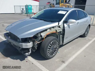 2017 Ford Fusion Energi SE with VIN 3FA6P0PU8HR242177, listed as a IAAI auction lot 42057898 with 119,435 mi miles. Bid and sale history available at carsss.com. Image 18.