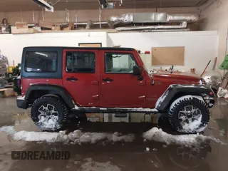 2014 Jeep Wrangler Unlimited Sport with VIN 1C4BJWDG6EL194569, listed as a IAAI auction lot 41549268 with 122,740 mi miles. Bid and sale history available at carsss.com. Image 14.