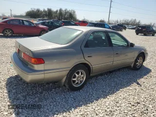 2000 Toyota Camry CE z VIN 4T1BG22K3YU009533, wystawiony jako Copart lot #48996855 z przebiegiem 132 705 mil mil oraz Szkoda całkowita • Salvage title. Historia ofert i sprzedaży dostępna na DreamBid. Obrazek 3.