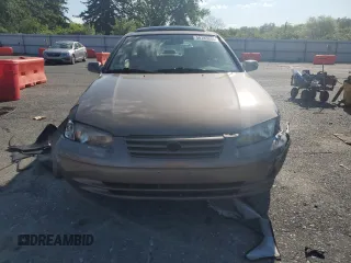1999 Toyota Camry LE z VIN JT2BG22K0X0295893, wystawiony jako Copart lot #56183655 z przebiegiem 327 172 mil mil oraz Szkoda całkowita • Salvage title. Historia ofert i sprzedaży dostępna na DreamBid. Obrazek 5.