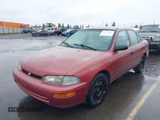 1997 Geo Prizm LSi with VIN 1Y1SK5265VZ457659, listed as a IAAI auction lot 41778510 with 149,073 mi miles. Bid and sale history available at carsss.com. Image 17.