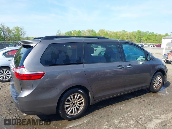 2015 Toyota Sienna XLE with VIN 5TDYK3DC9FS685768, listed as a IAAI auction lot 42062942 with 132,242 mi miles. Bid and sale history available at carsss.com. Image 6.