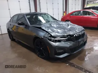 2022 BMW 3 Series 330i xDrive z VIN 3MW5R7J0XN8C70303, wystawiony jako IAAI lot #42121402 z przebiegiem 29 187 mil mil oraz . Historia ofert i sprzedaży dostępna na DreamBid. Obrazek 1.
