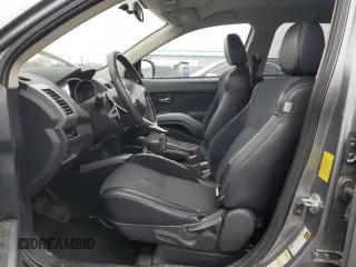 2013 Mitsubishi Outlander SE z VIN JA4JT3AW4DU000656, wystawiony jako Copart lot #51808395 z przebiegiem 158 479 mil mil oraz Szkoda całkowita • Salvage title. Historia ofert i sprzedaży dostępna na DreamBid. Obrazek 7.